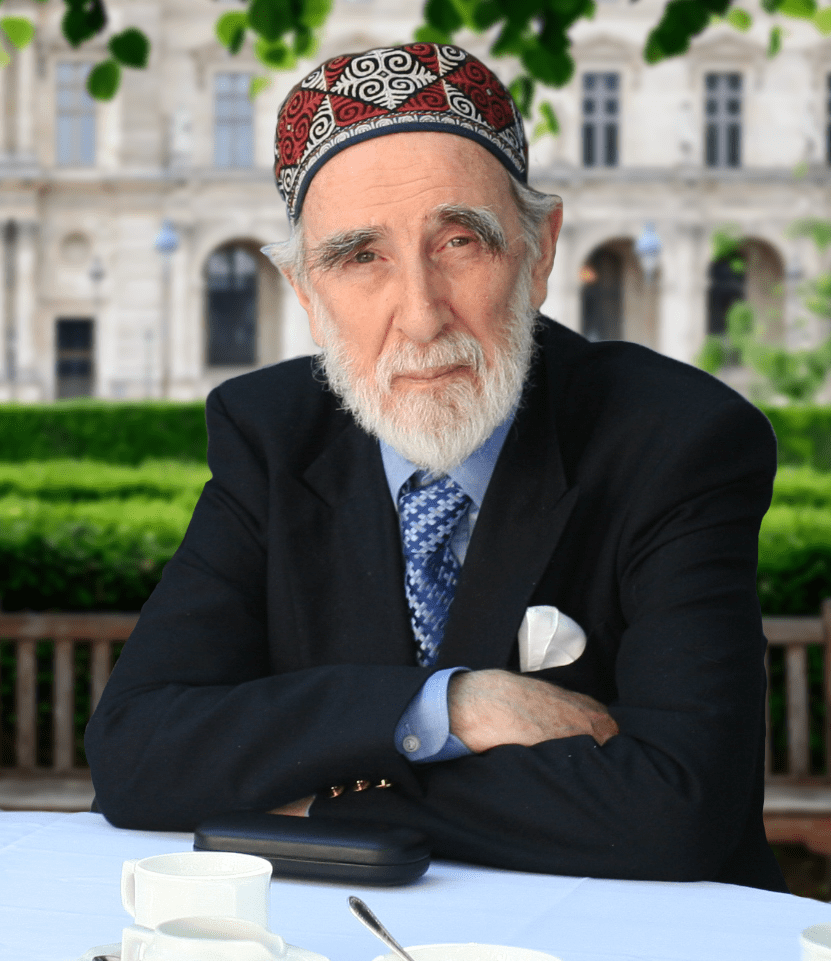 Archival black and white portrait of Shaykh Dr. Abdalqadir as-Sufi in contemplation
